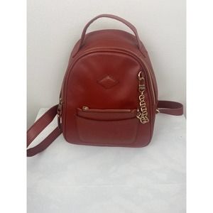 Back pack Purse Redish has a pocket on front outside with coin purse slips